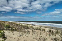 Bright Condo with Balcony Walk to Dewey Beach