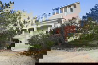 The Retreat 31496 Porpoise Way by Long  Foster